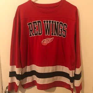 Long sleeve shirt that says Red Wings